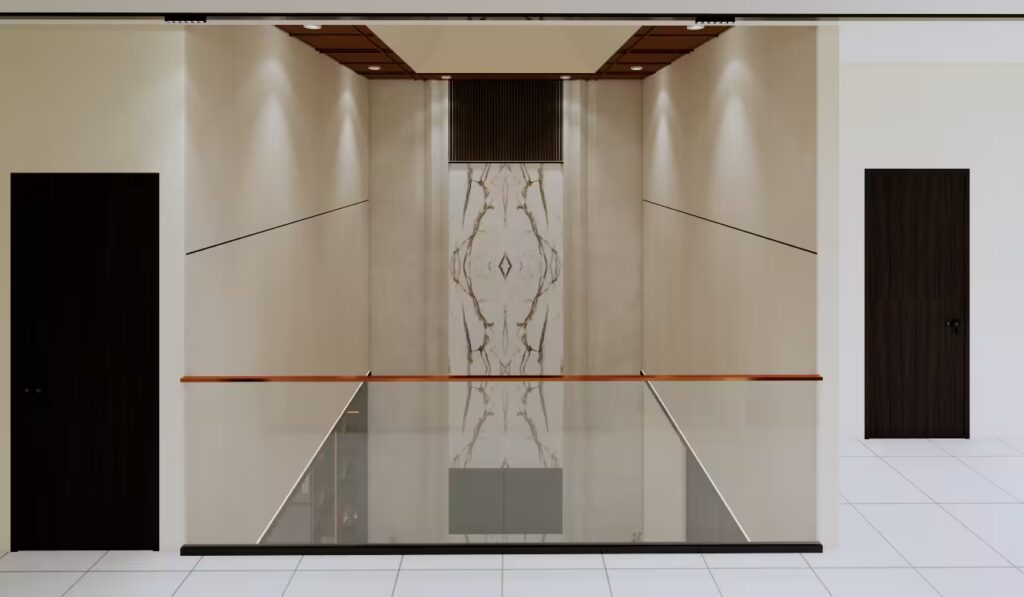 Area void GA House di lantai 2 dengan railing kaca transparan, dinding marmer motif simetris, dan pencahayaan spotlight modern kontemporer.