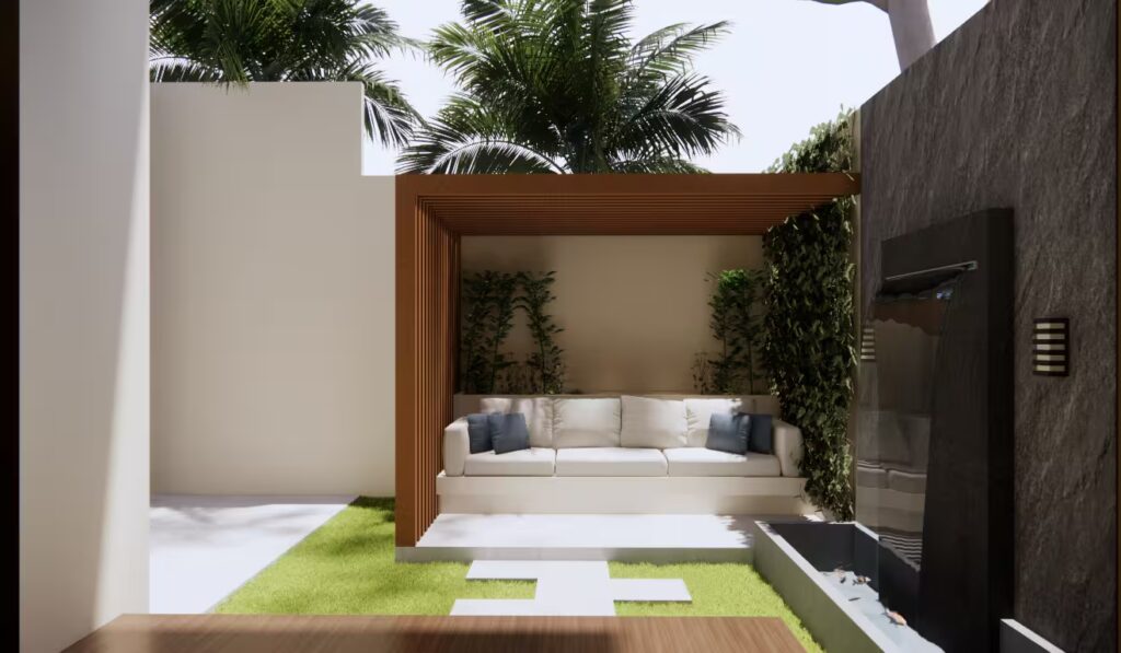 Area gazebo GA House bergaya modern kontemporer dengan sofa empuk, dinding tanaman hijau, dan kolam ikan kecil.