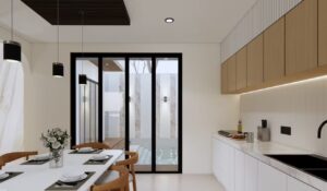Dapur rumah Mr. AM bergaya modern minimalis dengan dominasi material kayu dan marble putih, serta akses langsung ke area kolam renang.