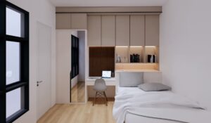 Kamar anak dengan meja belajar built-in dan lemari atas bergaya minimalis.
