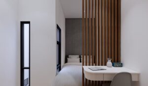 Kamar anak dengan partisi kayu vertikal dan meja belajar menyatu dengan dinding.