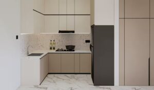 Dapur bentuk U dengan kabinet krem dan backsplash terrazzo minimalis.